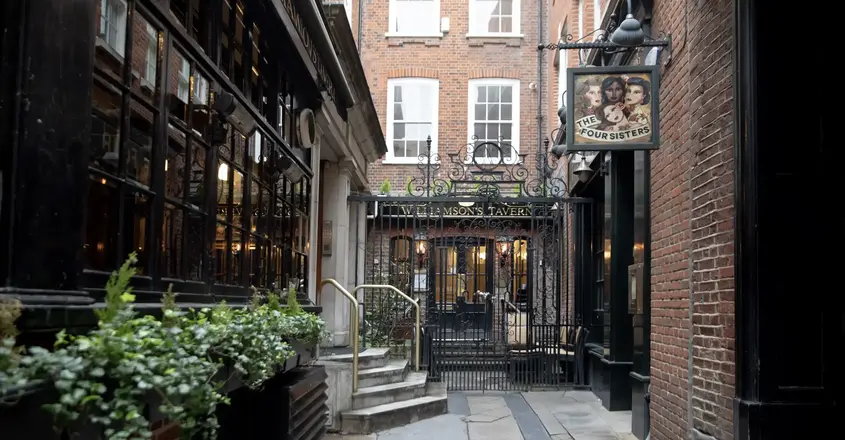 a brick building with a gate