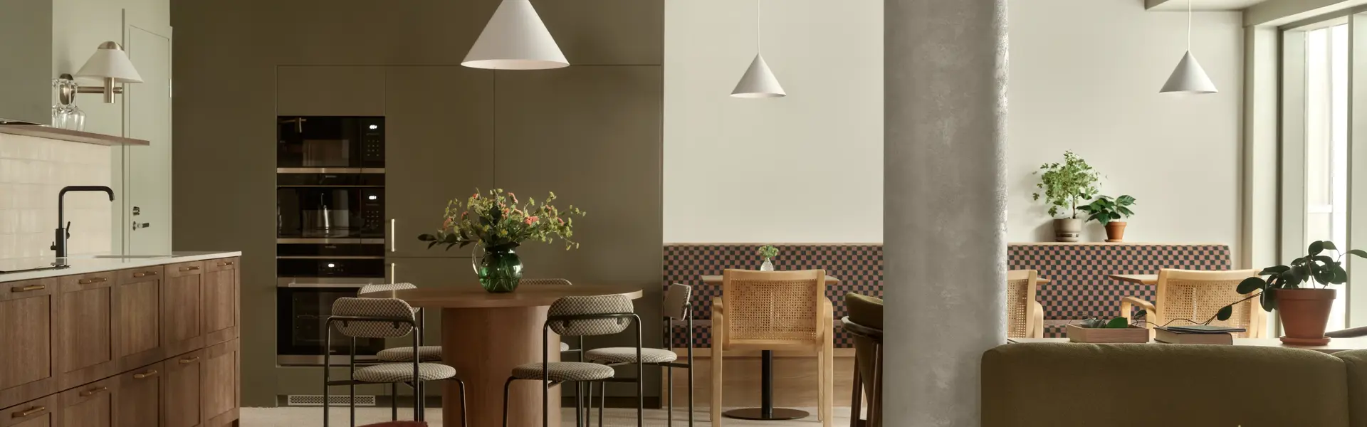 a room with a red chair and a table