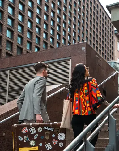 People walking up steps